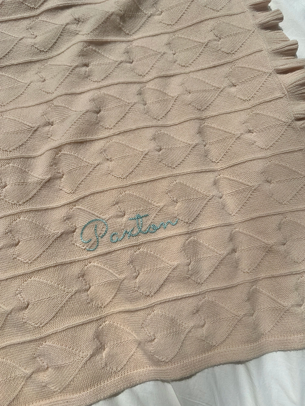 AU Baby merino wool baby blanket in Butter Cream, hand embroidered with name